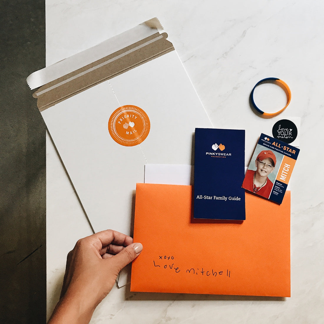 PINKY SWEAR FOUNDATION: THE ORANGE ENVELOPE PROGRAM