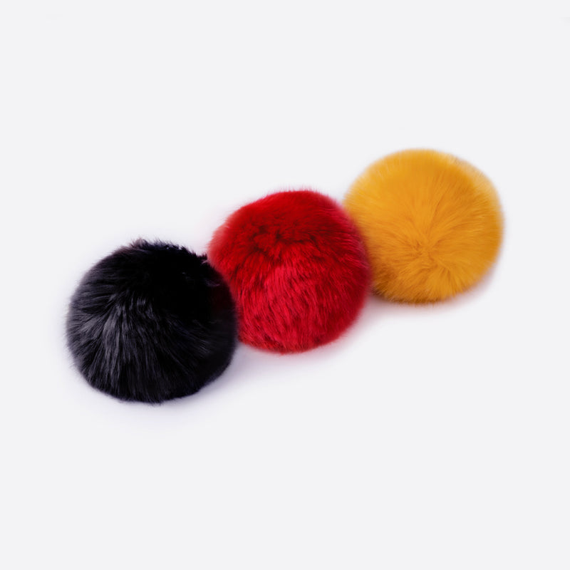 Rusty Yellow, Black, and Red Pom Pack